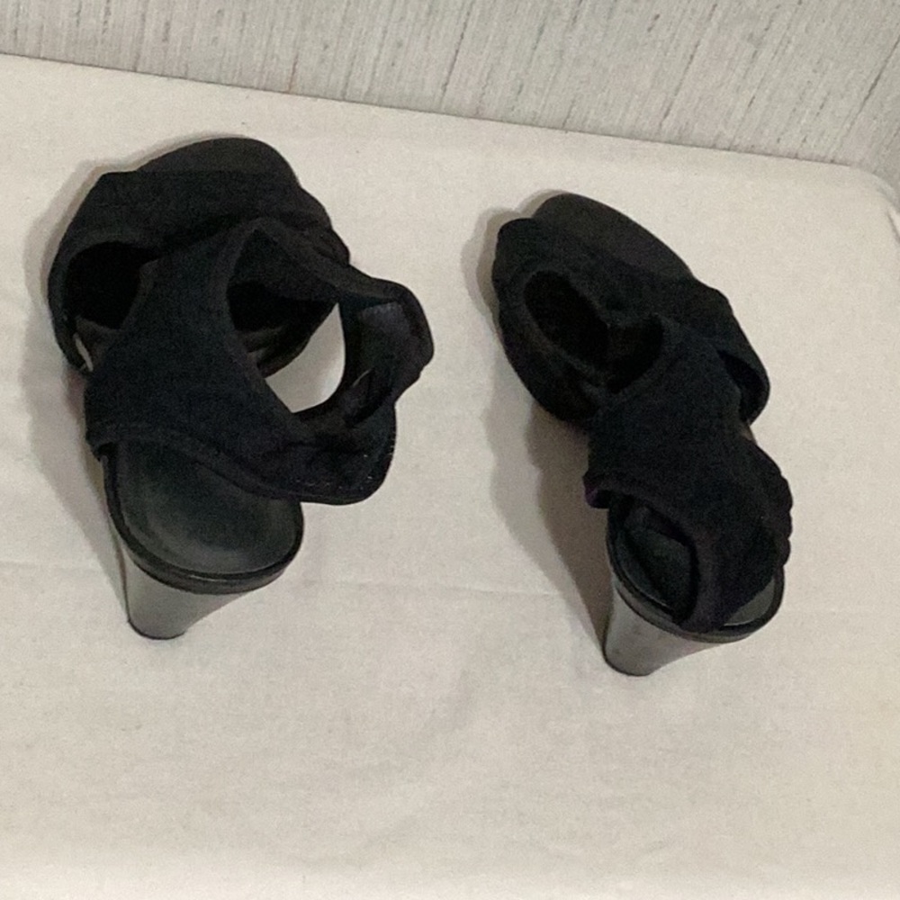 Stuwart Weitzman black open heels.